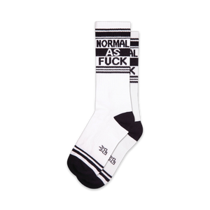 white and black crew length socks for men and women, black heel and toe, black text that reads 