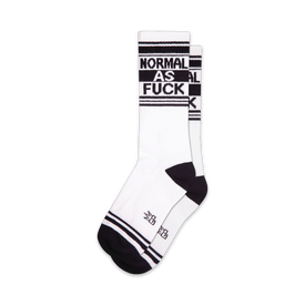 white and black crew length socks for men and women, black heel and toe, black text that reads "normal as fuck."   