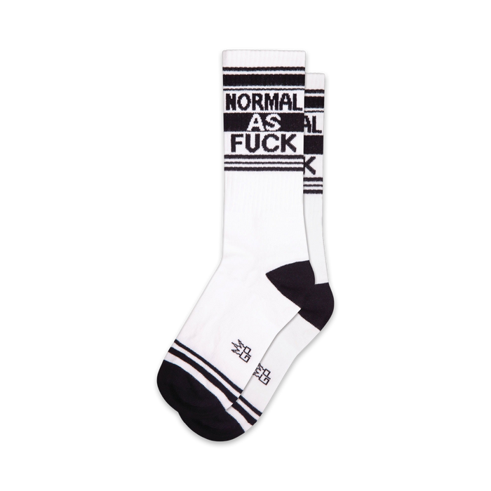 white and black crew length socks for men and women, black heel and toe, black text that reads 