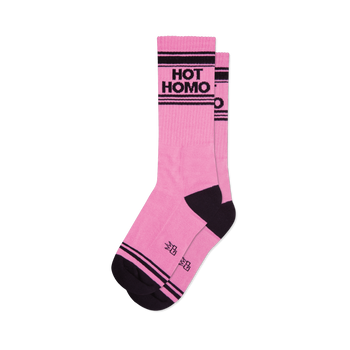 A pair of pink crew socks with black stripes and 'Hot Homo' in black lettering.  The socks have a dark charcoal heel and toe.