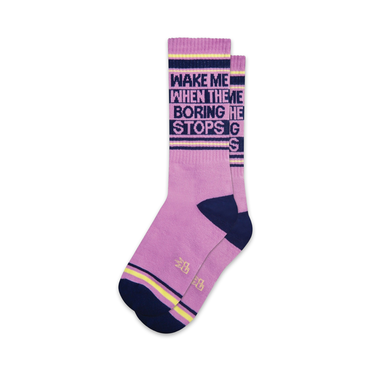 Pair of lavender crew socks with navy and yellow accents.  Text reads: 'Wake Me When the Boring Stops'.
