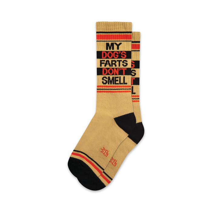 tan crew-length socks with black and red stripes, black heels and toes. statement: 