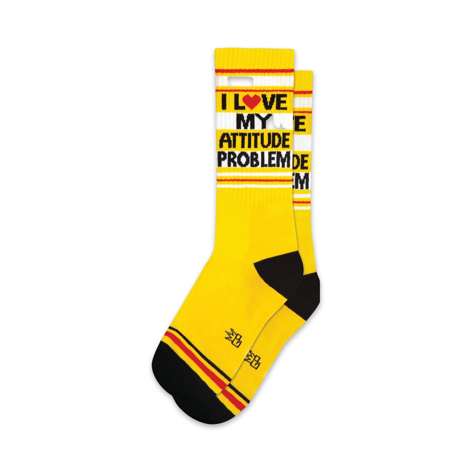 Pair of yellow crew socks with black and red stripes and the text 'I LOVE MY ATTITUDE PROBLEM'.
