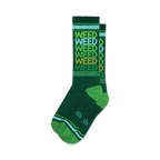 A pair of green crew socks with a repeating 'WEED' pattern in shades of green, gold, and light blue. The socks have green and light blue stripes at the cuff.