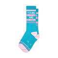 Pair of teal crew socks with pink stripes and the text 'Young Broke and Fabulous'. Fun, vibrant design.