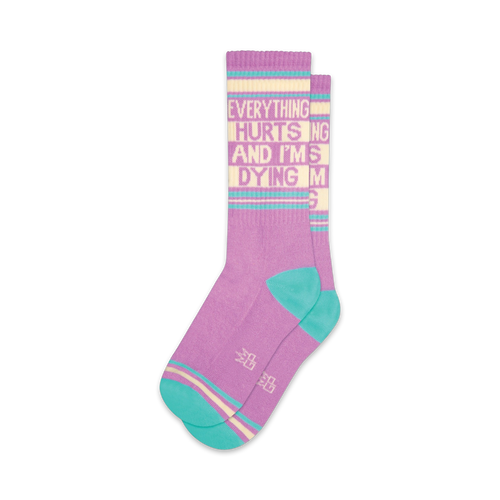 Pair of crew socks in purple and teal with the same text as the black pair. 