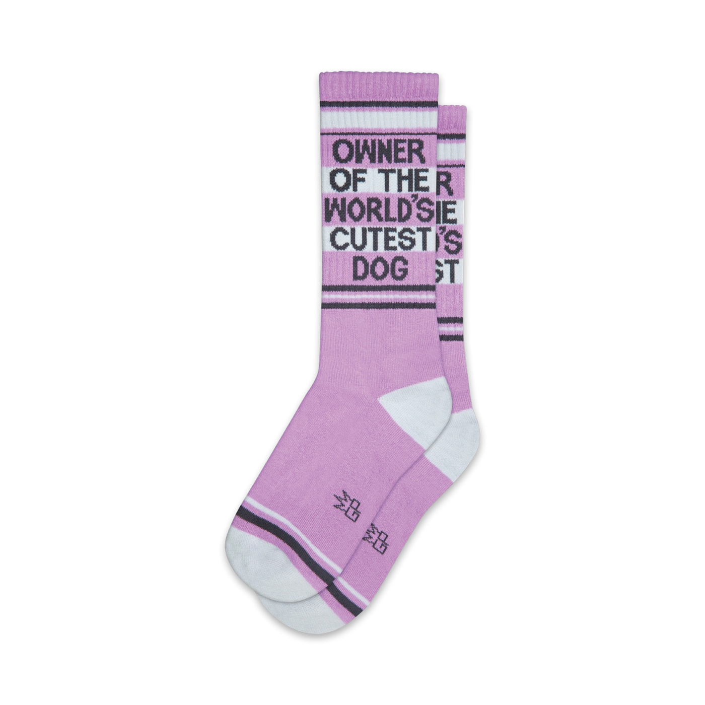 Pair of lavender crew socks with a dark gray 'Owner of the World's Cutest Dog' graphic and white/gray stripes near the cuffs.
