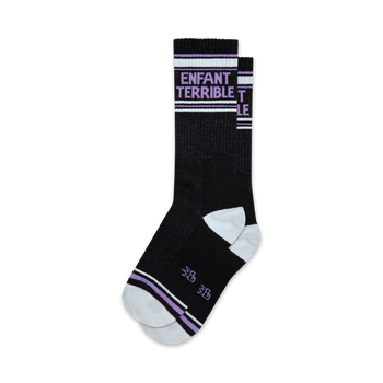 black crew socks with "enfant" knitted on the left sock and "terrible" on the right in purple for men and women.  