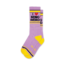 funny purple socks for men and women with the text "i love being weird". yellow heels, toes, and cuffs.  