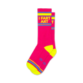 Pair of pink crew socks with neon yellow stripes and the words 'I Fart Art' displayed vertically.