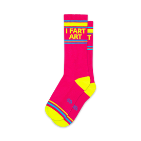 yellow letters spell "i fart art" on pink socks with yellow toes and heels. blue, yellow, and white striped band around the top. for men and women. crew.  