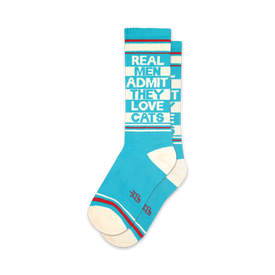 blue and white knee length socks with "real men admit they love cats" written in white.  