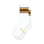 Pair of white ankle socks with a mustard yellow and black horizontal stripe reading 'BOURBON'. Retro design.