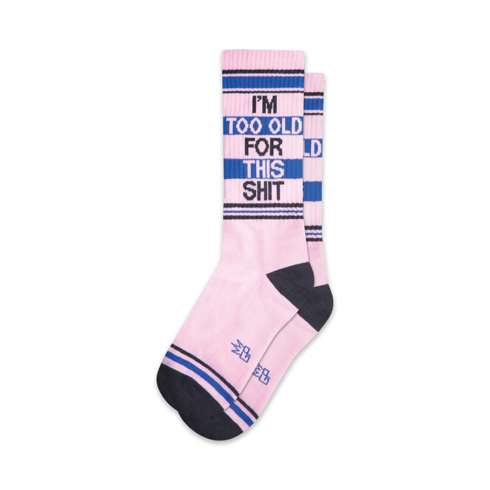 pink socks with black toe and heel, blue and black stripes at top, and 