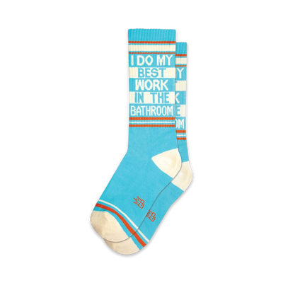 blue novelty socks with the words 'i do my best work in the bathroom' in white, white toes and heels and orange stripes around the top.  