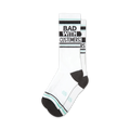 Pair of white crew socks with black and teal stripes and the text 'BAD WITH CUSTOMERS' in black.