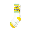 Pair of white crew socks with yellow and lime green stripes.  Text reads: 'Cocktails First Questions Later'.