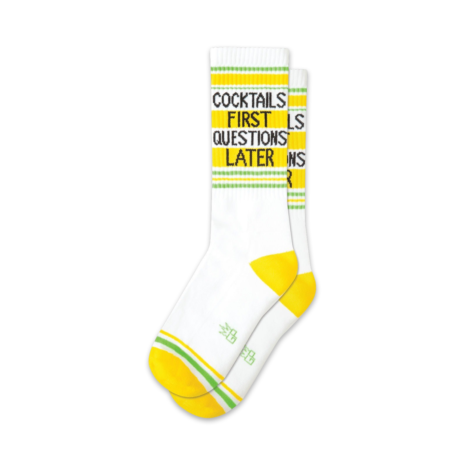 Pair of white crew socks with yellow and lime green stripes.  Text reads: 'Cocktails First Questions Later'.