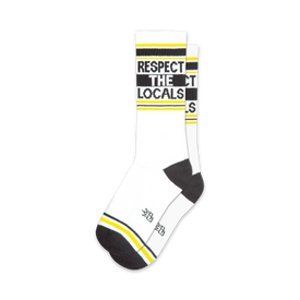 respect the locals socks in white with black and yellow striped tops, black heels, and toes for men and women with the words "respect the locals" in yellow outlined black letting.  