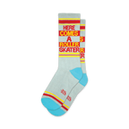 Pair of light gray crew socks with red and yellow stripes and the text 'Here Comes A Roller Skater'.  Features a teal colored heel and toe.