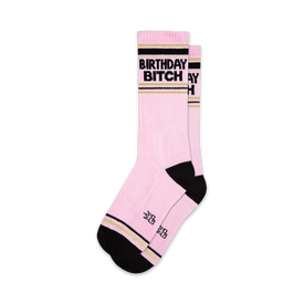 pink socks with black and gold stripes. unisex. xl crew length. "birthday bitch" text.   