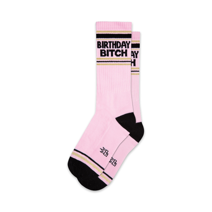 pink socks with black and gold stripes. unisex. xl crew length. 