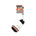 White crew socks with black and orange stripes and 'BODY BY PICKLEBALL' text.