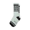 Pair of light teal crew socks with black stripes and repeated expletives printed vertically.