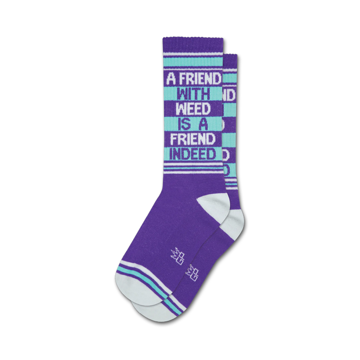 purple and white crew socks with green and blue stripes and the words 