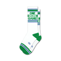 Pair of white crew socks with green and blue stripes and the text 'ONE MORE GAME!' in green. 