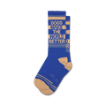 Pair of blue and beige crew socks with the text 'Dogs Make The World Better' in a retro stripe design.