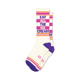 unisex white crew socks with purple toes, heels, and cuffs, 2 orange stripes, and 'eat all the ice cream' in purple and pink.   