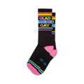 Pair of black crew socks with 'Glad To Be Gay' in rainbow lettering and pink, blue, orange, and yellow stripes.