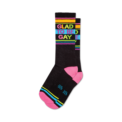 black crew socks with "glad to be gay" written in rainbow colors, plus colorful stripes at the top and bottom.   