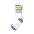 Pair of white crew socks with rainbow-colored 'Bookworm' text and purple and blue stripes at the cuff.