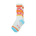 Pair of light grey crew socks with red and yellow text reading 'DON'T LET THE BULLSHIT GET YOU DOWN'.  Features a light blue and red stripe detail at the cuffs.