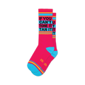 A pair of pink crew socks with teal cuffs and yellow stripes.  Black text reads 'If You Can't Tone It, Tan It'.