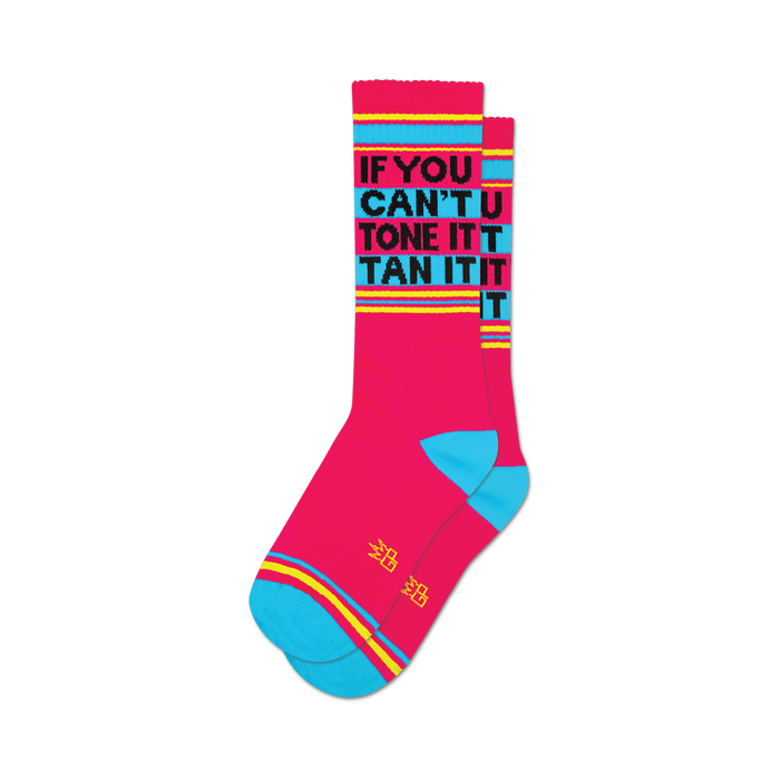 socks that are pink with the words 'if you can't tone it, tan it' in yellow, blue, and black. }}