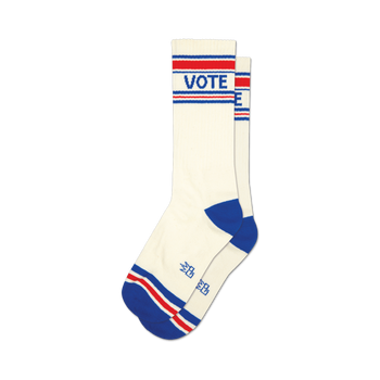 a pair of white socks with red and blue stripes at the top and the word 'vote' in large blue letters on the front.