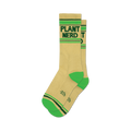 Pair of cream-colored crew socks with a 'Plant Nerd' graphic in dark green.  Neon green stripes accent the top and bottom cuffs.