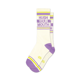 a pair of socks with the text 'hush your mouth' on them.