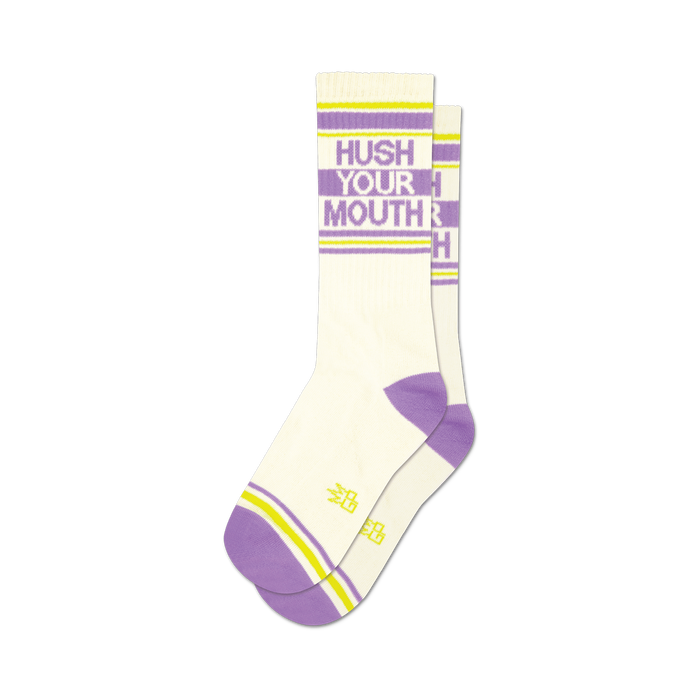 a pair of socks with the text 'hush your mouth' on them. }}