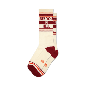 a pair of socks with the words 'see you in hell' on them.
