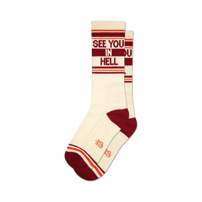 a pair of socks with the words 'see you in hell' on them. }}