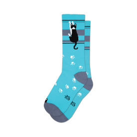 socks that are blue with a tuxedo cat wearing a bow tie on the front. the cat is black with white paws and a white tip on its tail. the socks also have gray toes and heels.