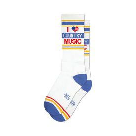 socks that are white with blue and red stripes at the top and blue heels and toes. they have the words 'i heart country music' on them.