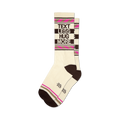 Pair of cream crew socks with brown and pink stripes. The words 'Text Less Hug More' are displayed vertically on the socks.