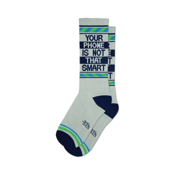 the white socks have the words 'your phone is not that smart' on them in blue. the words are surrounded by green and blue stripes.
