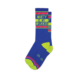 a pair of blue socks with the words 'anxiety is my influencer' in yellow and pink.