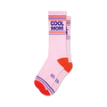 Pair of pink crew socks with 'Cool Mom' in purple text and orange, purple, and white stripes around the top and heel.